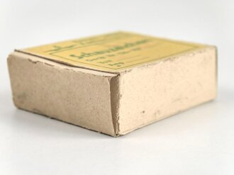 Luftwaffe, Gitterschauzeichen Fl 32525-4, ungebraucht, in der originalen Umverpackung
