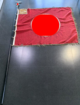 Fahne der NSDAP Ortsgruppe Leussow. Die Hakenkreuze...