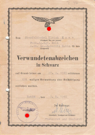 Fallschirmjäger Regiment Reil, Verleihungsurkunde eines Oberfeldwebel zum Verwundetenabzeichen in schwarz datiert 5. Mai 1945. Dazu ein kleinformatiges Foto.