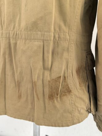 Waffen SS Tropenfeldbluse , sogenannte Sahariana. Getragenes Kammerstück mit original vernähtem Ärmaladler. Ungereinigt