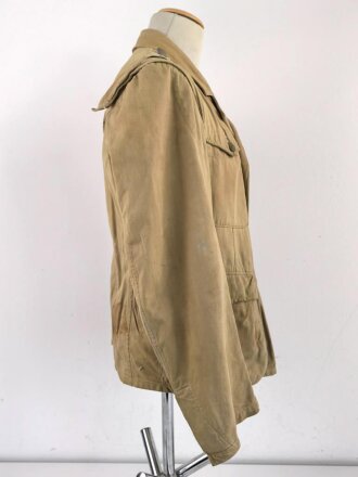 Waffen SS Tropenfeldbluse , sogenannte Sahariana. Getragenes Kammerstück mit original vernähtem Ärmaladler. Ungereinigt