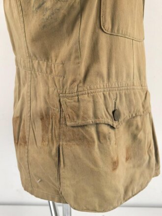 Waffen SS Tropenfeldbluse , sogenannte Sahariana. Getragenes Kammerstück mit original vernähtem Ärmaladler. Ungereinigt