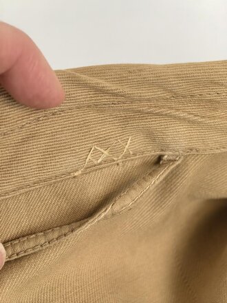 Waffen SS Tropenfeldbluse , sogenannte Sahariana. Getragenes Kammerstück mit original vernähtem Ärmaladler. Ungereinigt