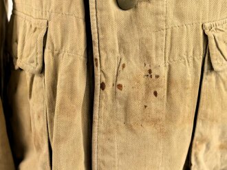 Waffen SS Tropenfeldbluse , sogenannte Sahariana. Getragenes Kammerstück mit original vernähtem Ärmaladler. Ungereinigt