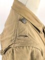 Waffen SS Tropenfeldbluse , sogenannte Sahariana. Getragenes Kammerstück mit original vernähtem Ärmaladler. Ungereinigt