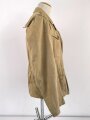 Waffen SS Tropenfeldbluse , sogenannte Sahariana. Getragenes Kammerstück mit original vernähtem Ärmaladler. Ungereinigt