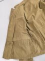 Waffen SS Tropenfeldbluse , sogenannte Sahariana. Getragenes Kammerstück mit original vernähtem Ärmaladler. Ungereinigt