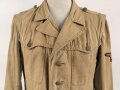 Waffen SS Tropenfeldbluse , sogenannte Sahariana. Getragenes Kammerstück mit original vernähtem Ärmaladler. Ungereinigt
