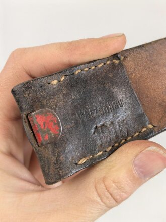1.Weltkrieg, feldgraues Koppel für Berittene datiert 1915.  Gesamtlänge 104cm, selten. Die Schnalle leider neuzeitlich rot lackiert, dies leicht zu verbessern.