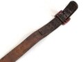 1.Weltkrieg, feldgraues Koppel für Berittene datiert 1915.  Gesamtlänge 104cm, selten. Die Schnalle leider neuzeitlich rot lackiert, dies leicht zu verbessern.