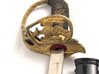 Preussen, Infanterie Offiziers Degen IOD Modell 1889 in Luxusausführung. Guter Gesamtzustand, die Scheide alt überlackiert. das Klappgefäß bleibt nicht am Griffstück, sondern klappt in seine jetztige Form zurück.