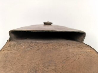 1. Weltkrieg, Hufeisentasche datiert 1915, ungereinigtes Stück