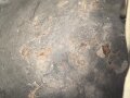 U.S. WWII steel helmet shell, front seam. Reused by U.S. Army after WWII. Uncleaned