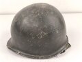 U.S. WWII steel helmet shell, front seam. Reused by U.S. Army after WWII. Uncleaned