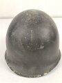 U.S. WWII steel helmet shell, front seam. Reused by U.S. Army after WWII. Uncleaned