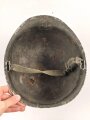 U.S. WWII steel helmet shell, front seam. Reused by U.S. Army after WWII. Uncleaned