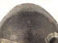 U.S. WWII steel helmet shell, front seam. Reused by U.S. Army after WWII. Uncleaned