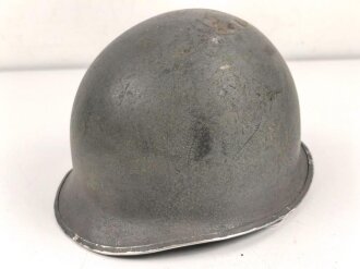 U.S. WWII steel helmet shell, front seam, fixed bail. Reused by U.S. Army after WWII, cleaned.