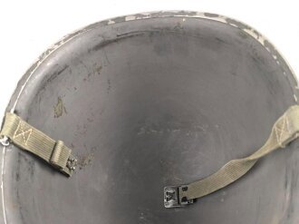 U.S. WWII steel helmet shell, front seam, fixed bail. Reused by U.S. Army after WWII, cleaned.