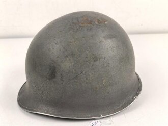U.S. WWII steel helmet shell, front seam, fixed bail. Reused by U.S. Army after WWII, cleaned.