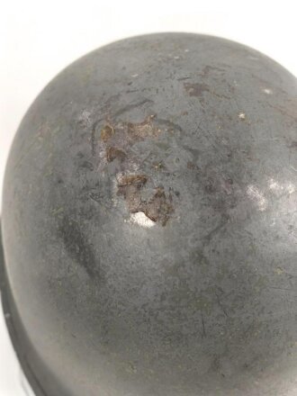 U.S. WWII steel helmet shell, front seam, fixed bail. Reused by U.S. Army after WWII, cleaned.
