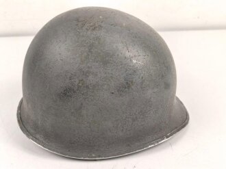 U.S. WWII steel helmet shell, front seam, fixed bail. Reused by U.S. Army after WWII, cleaned.