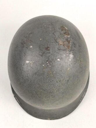U.S. WWII steel helmet shell, front seam, fixed bail. Reused by U.S. Army after WWII, cleaned.