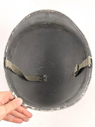 U.S. WWII steel helmet shell, front seam, fixed bail. Reused by U.S. Army after WWII, cleaned.