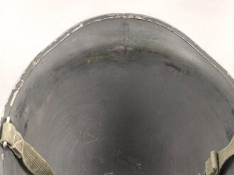 U.S. WWII steel helmet shell, front seam, fixed bail. Reused by U.S. Army after WWII, cleaned.