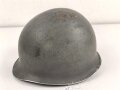 U.S. WWII steel helmet shell, front seam, fixed bail. Reused by U.S. Army after WWII, cleaned.