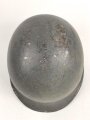 U.S. WWII steel helmet shell, front seam, fixed bail. Reused by U.S. Army after WWII, cleaned.