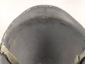 U.S. WWII steel helmet shell, front seam, fixed bail. Reused by U.S. Army after WWII, cleaned.