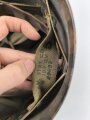 U.S. WWII steel helmet liner. "Firestone 44" Uncleaned, original paint. reused by U.S. Air Force after WWII