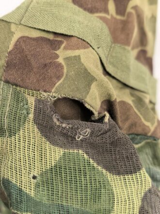 U.S. Marine Corps WWII, “Duck Hunter” camo helmet cover with mosquito net. Unfortunately cut down