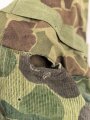 U.S. Marine Corps WWII, “Duck Hunter” camo helmet cover with mosquito net. Unfortunately cut down