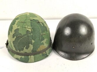 U.S. Army, M1 steel helmet with pattern 1964 liner and Mitchell cover.
