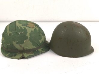 U.S. Army, M1 steel helmet with pattern 1964 liner and Mitchell cover.