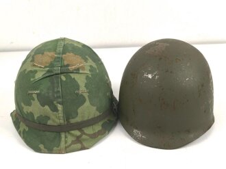 U.S. Army, M1 steel helmet with pattern 1964 liner and Mitchell cover.