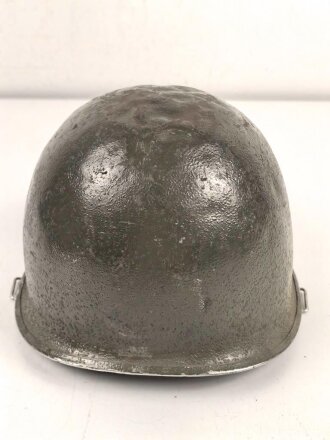 U.S. Army WWII, front seam M1 steel helmet shell. Original paint, no idea when the number was attached