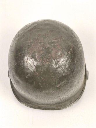 U.S. Army WWII, front seam M1 steel helmet shell. Original paint, no idea when the number was attached
