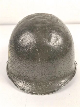 U.S. Army WWII, front seam M1 steel helmet shell. Original paint, no idea when the number was attached