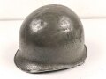 U.S. Army WWII, front seam M1 steel helmet shell. Original paint, no idea when the number was attached