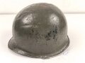 U.S. Army WWII, front seam M1 steel helmet shell. Original paint, no idea when the number was attached