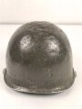 U.S. Army WWII, front seam M1 steel helmet shell. Original paint, no idea when the number was attached