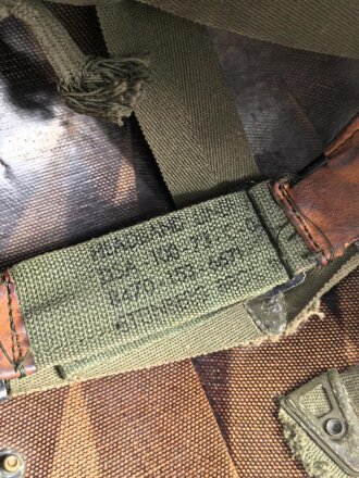 U.S. Army, M1 steel helmet with early liner ( CAPAC 1953 )  and Mitchell cover. Liner sweatband and cover dated 1973