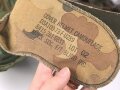 U.S. Army, M1 steel helmet with early liner ( CAPAC 1953 )  and Mitchell cover. Liner sweatband and cover dated 1973
