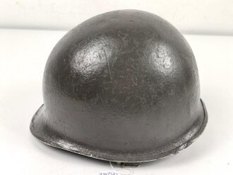 U.S. Army WWII, front seam M1 steel helmet shell. Original paint, reused by US Army after WWII
