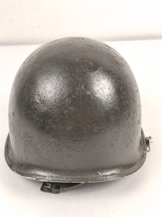U.S. Army WWII, front seam M1 steel helmet shell. Original paint, reused by US Army after WWII