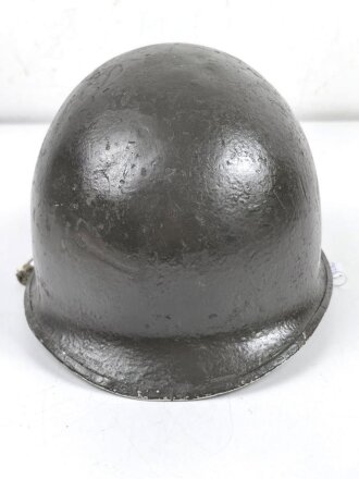 U.S. Army WWII, front seam M1 steel helmet shell. Original paint, reused by US Army after WWII