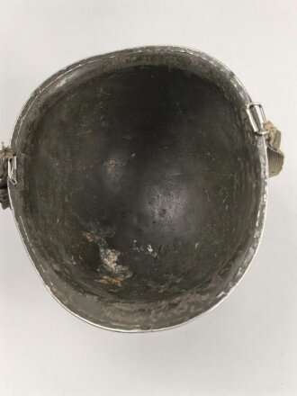 U.S. Army WWII, front seam M1 steel helmet shell. Original paint, reused by US Army after WWII